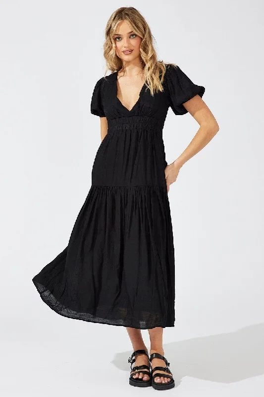 Maxi dresses for a chic garden reception with white floral designs -Black Maxi Dress Puff Sleeve